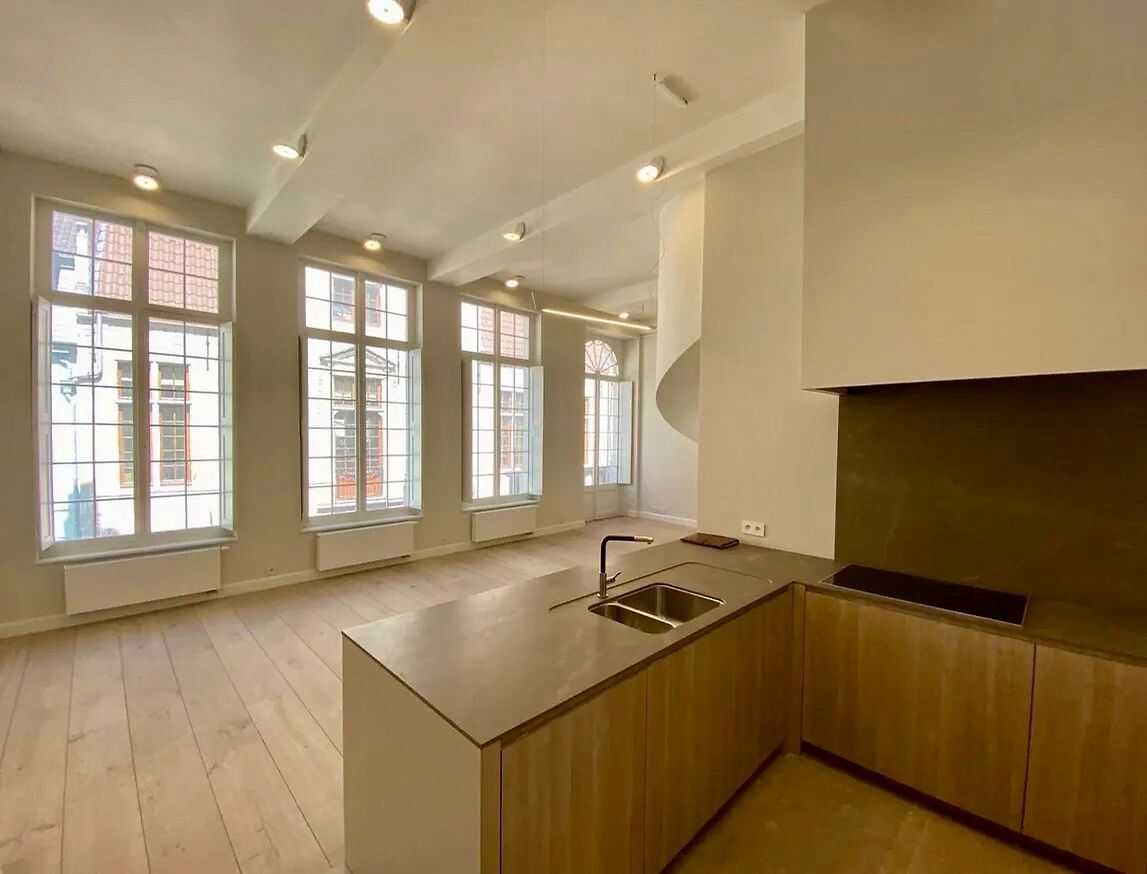 Stijlvol duplexappartement met zonnig dakterras in het historische hart van Gent